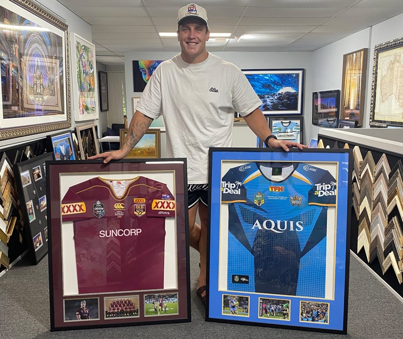 Man with two jersey in frame — Gold Coast Printing & Framing in Mudgeeraba, QLD