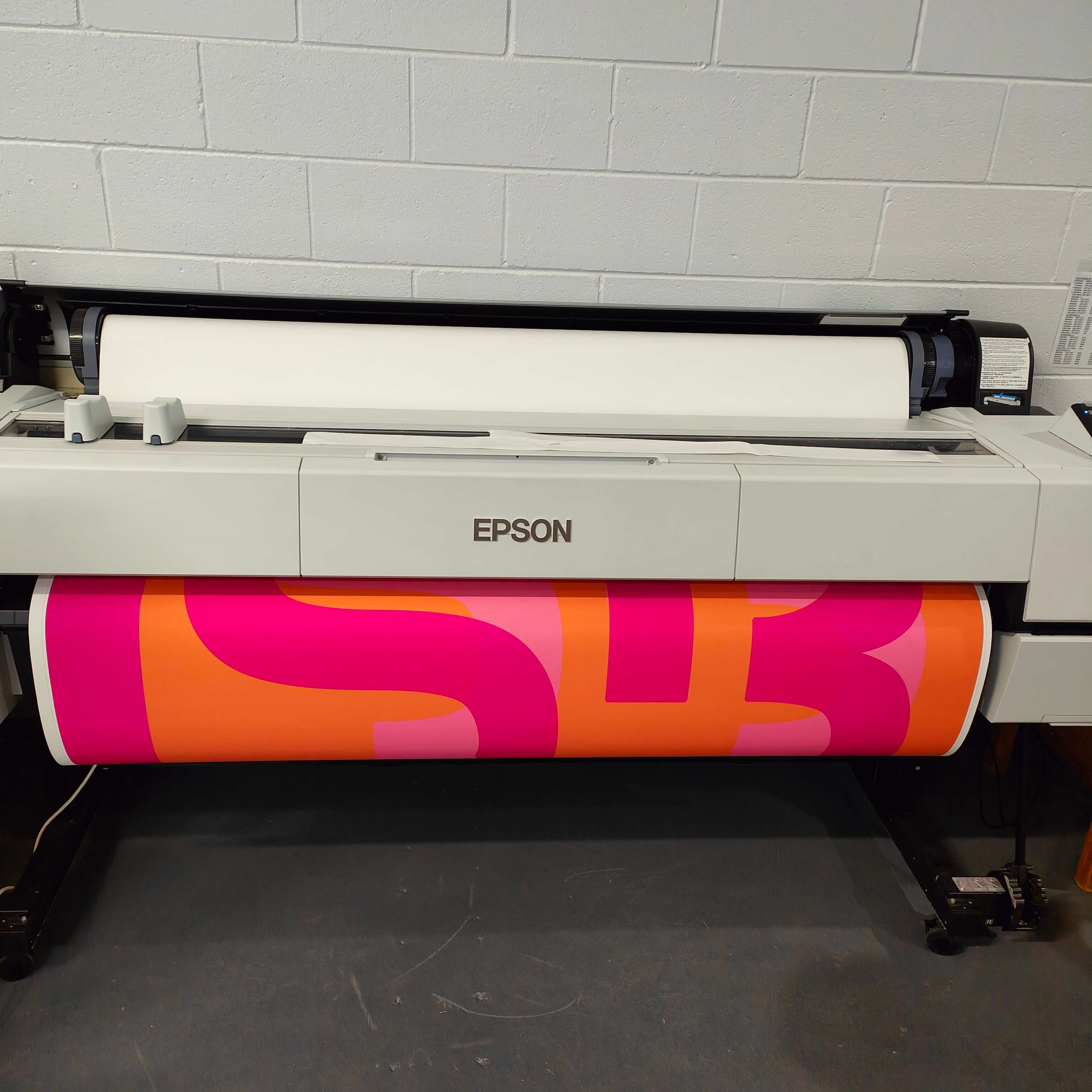 Canvas Print coming out of professional print machine
