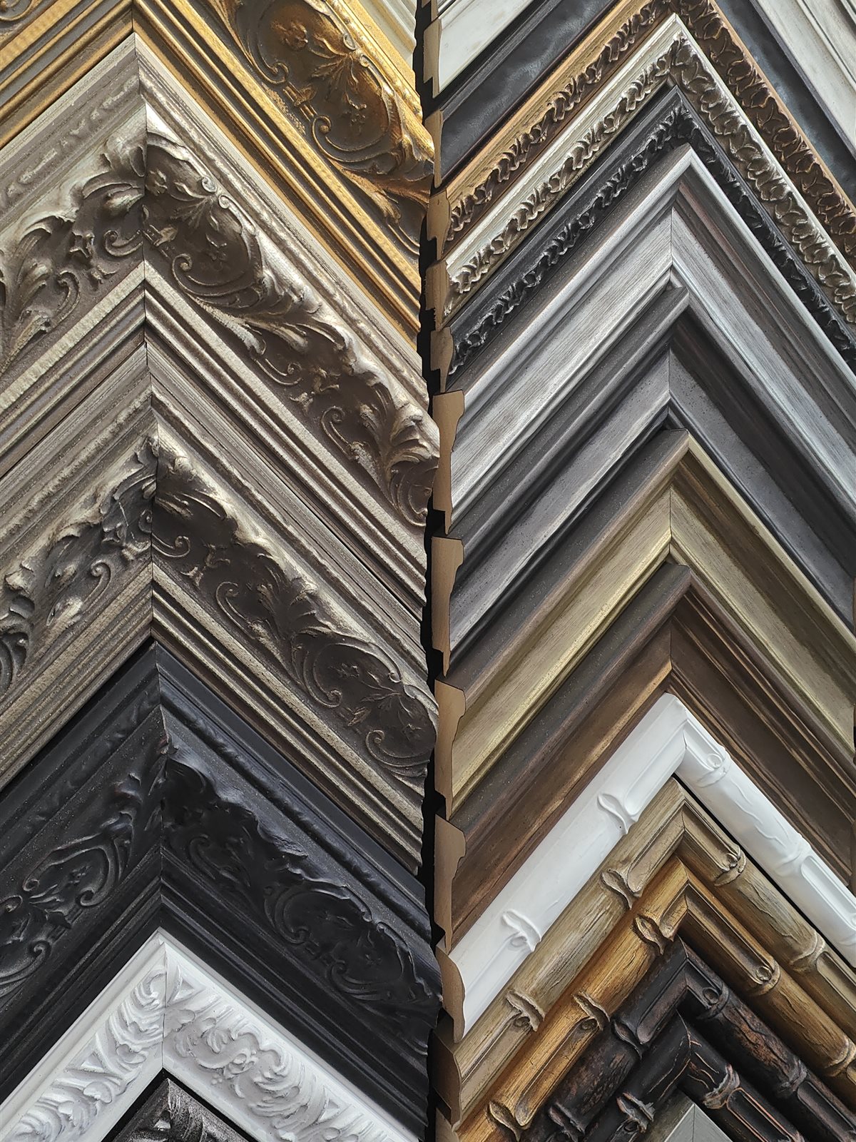 Range of ornate and timber frame moulding corner samples
